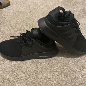 Black adidas running shoes